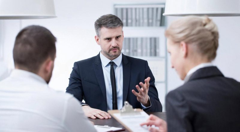 Hiring managers interviewing a candidate for a UAE role that requires strong emotional intelligence